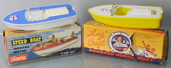 2 SPEED BOATS: plastic, both 7 1/2" long, battery operated, not tested, orig boxes minor wear, C9.