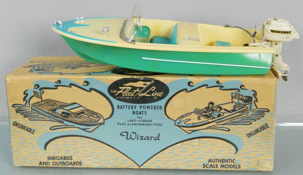 FLEET LINE WIZARD MOTOR BOAT: plastic, 14" long, battery operated, not tested, plastic on boat has yellowed, w/Mercury Motor, metal, orig box minor wear, C7-8.