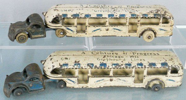 2 ARCADE GREYHOUND BUSES: painted cast iron, 11 1/2" long, Century of Progress Chicago 1933, both have worn tires, 1 tire replaced, C3-4.