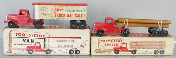 2 TOOTSIETOY MACK TRUCKS: both 9" long, 589 Van, top removable, hood has old sticker residue, orig box missing inner flap, 569 Logger, orig box rough, C8.