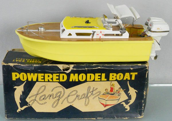 LANG CRAFT MOTOR BOAT: wood & plastic, 14" long, battery operated, not tested, missing roof mounted aeriel, w/2 motors, decals worn, orig box worn, C8.