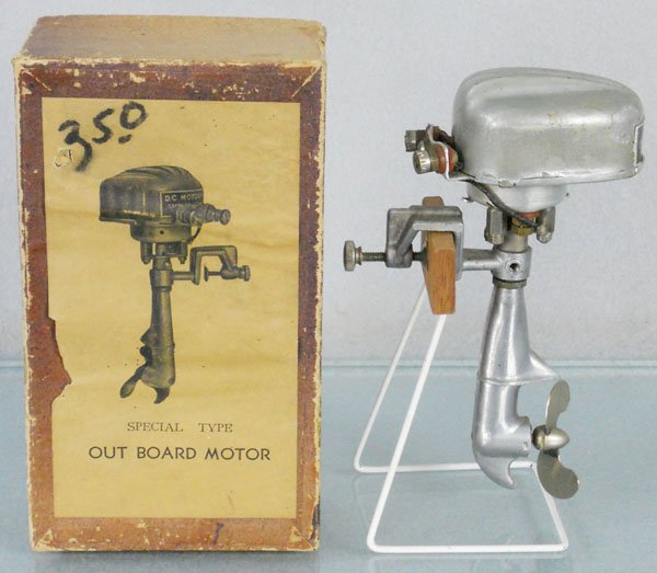 IMP OUTBOARD MOTOR: tin, 5 1/4" tall, battery operated, not tested, orig box worn, stand not included, C7-8.