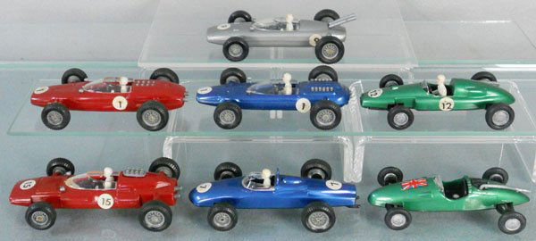 7 POLITOYS RACERS: plastic, 64, 202, 204, 63, 56, 57, 51, the 51 is missing the driver, C8-9.
