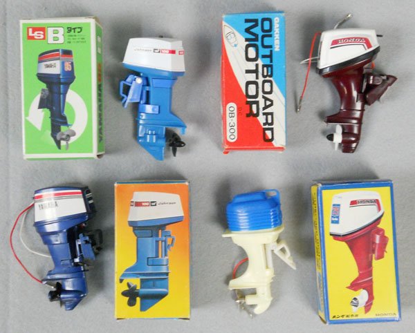 4 OUTBOARD MOTORS: plastic, all are 3 3/4" tall, by Gakken, Yamaha, Omaha & Johnson, all battery operated, not tested, orig boxes minor wear, C9.