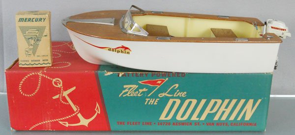FLEET LINE THE DOLPHIN MOTOR BOAT: plastic & wood, 16" long, w/Mercury Motor, metal, battery operated, not tested, orig boxes & inserts, C7-8.