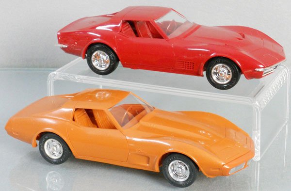 2 MPC CORVETTE PROMOS: plastic, 1974 Corvette, orange metallic, 1971 Corvette, red, C8-9.