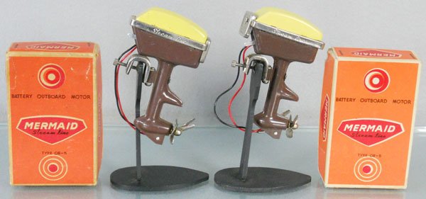 2 MERMAID OUTBOARD MOTORS: litho tin, 3 3/4" tall, battery operated, not tested, orig boxes minor wear, stands not included, C8.