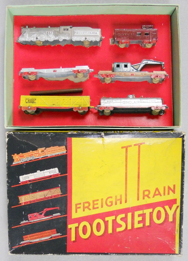 TOOTSIETOY 5550 FREIGHT TRAIN SET: PRR loco w/5 freight cars, orig box & insert minor wear, C7-8.