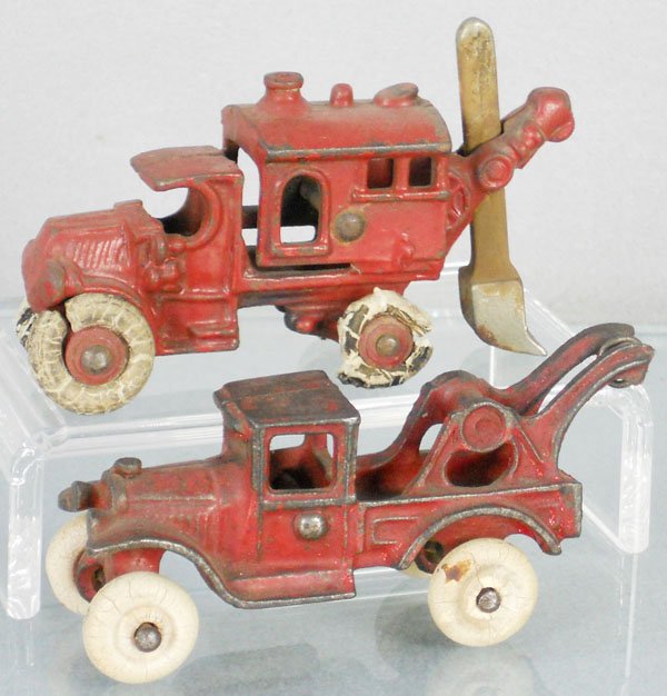 2 HUBLEY TRUCKS: painted cast iron, 4 1/4" long, Digger & Wrecker, 1 has worn tires, C4-5.