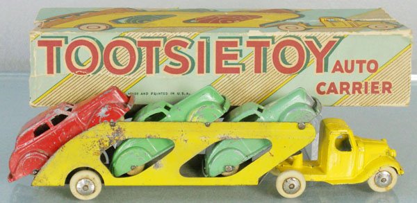TOOTSIETOY 187 AUTO CARRIER: Mack Carrier w/2 231 Coupes & 230 Sedan, some oxidation spots on trailer, orig box rough, C4.