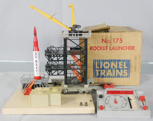 LIONEL 175 ROCKET LAUNCHER: O ga, base has 2 handrails reglued, missing ribbon cable, gantry has 2 glued handrails, orig box minor wear, C6.