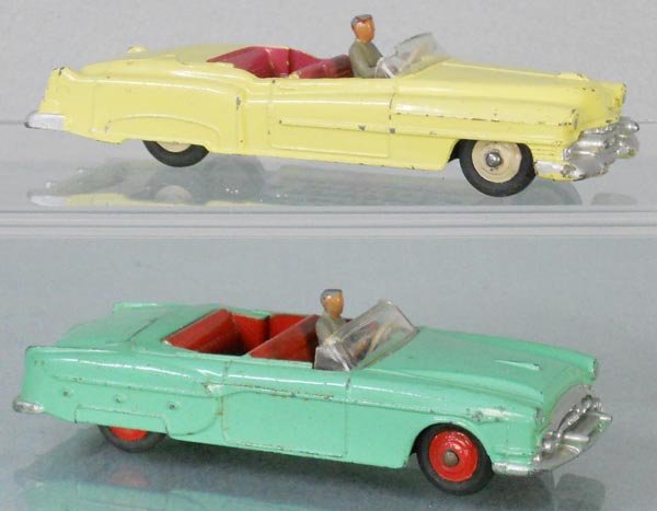 2 DINKY AUTOS: 131 Cadillac, yellow, windshield cracked, 132 Packard, green, C5-7.