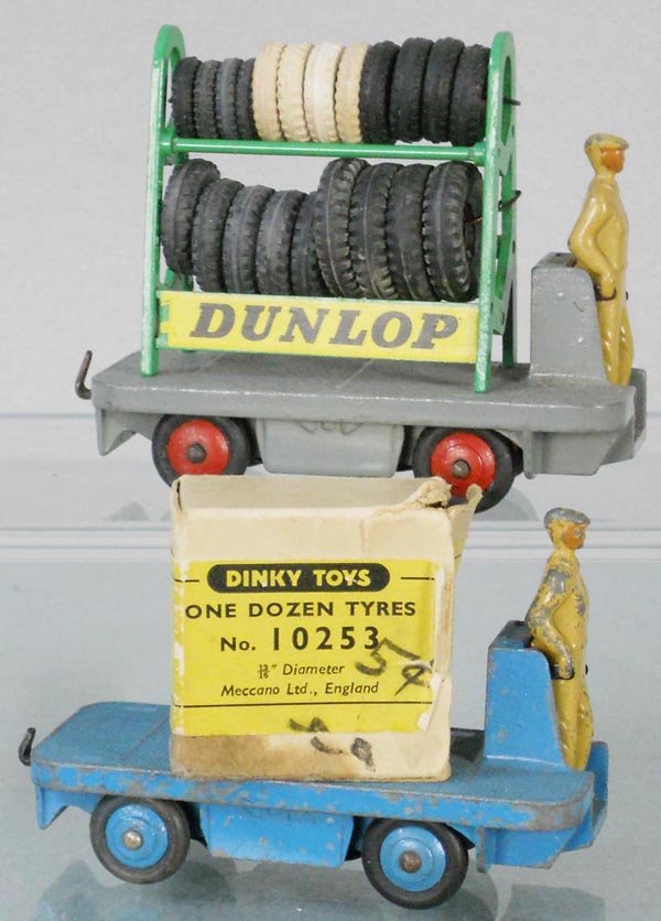 DINKY LOT: 2 #14A BEV Electric Trucks, blue & gray, 786 Dunlop Tire Rack, 10253 Box of Tires, orig box worn, C5-8.