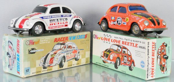 2 TAIYO VOLKSWAGEN BEETLES: litho tin, battery operated, not tested, 9 1/2" long, orig boxes minor wear, C7-9.