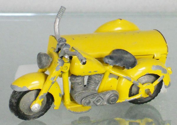 TEKNO 763 HARLEY DELIVERY MOTORCYCLE: yellow, decals chipped, handlebar bent, C4-5.