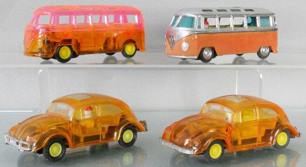 4 CH VOLKSWAGEN VEHICLES: plastic, Hong Kong, 2 #607 Beetles, frictions working, 6" long, 1 has a driver, 2 #605 Microbuses, frictions barely working, both 5 3/4" long, 1 has a driver, opaque van, faded & worn, C4, rest C6-7.