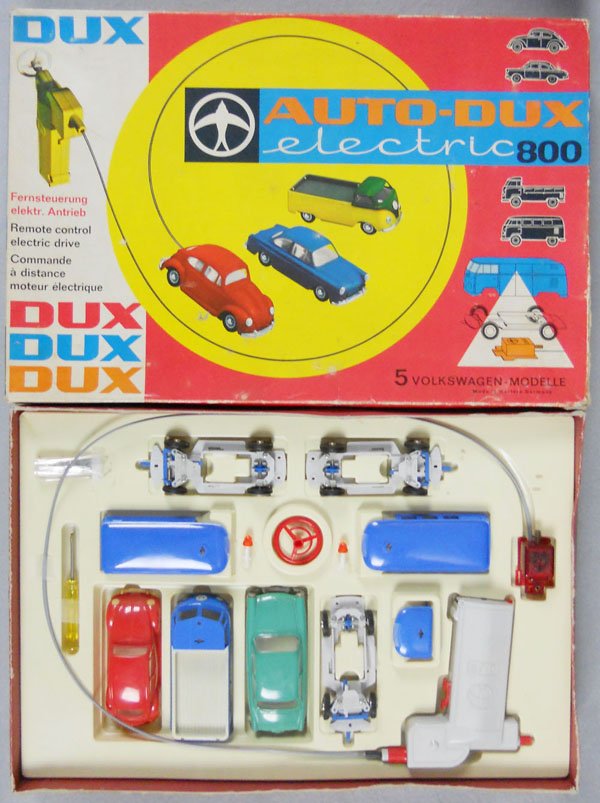AUTO DUX ELECTRIC 800 SET: unassembled set that makes 3 different plastic VW's w/remote control steering, orig box & insert minor wear, C8-9.
