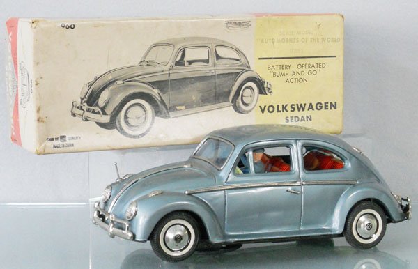 BANDAI 960 VOLKSWAGEN BEETLE: litho tin, battery operated, not tested, silver blue, 10 1/2" long, orig box minor wear, C8.