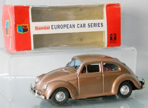 BANDAI 742 VOLKSWAGEN BEETLE: litho tin, friction working, 8" long, orig box minor wear, C9.