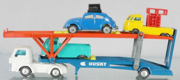 4 HUSKY VEHICLES: 2002 Hoyner Transporter, 20 Beetle, 12 Highway Truck, 15 Pick Up, C6-8.