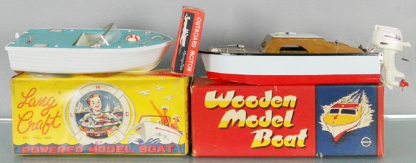 2 TOY SPEED BOATS: Lang Craft L302 Speed Boat, plastic, 9 1/2" long, Union Craft Speed Boat, wood, 10" long, orig boxes worn, C7-8.