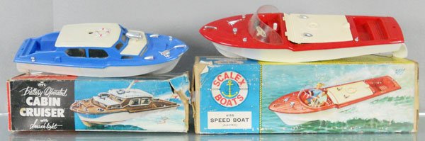 2 PLASTIC MOTOR BOATS: Rays 1768 Cabin Cruiser, 13" long, chip in bow, missing some trim, Scalex 415S Speed Boat, 14" long, orig boxes rough, C6-8.