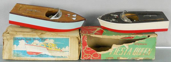 2 TOY SPEED BOATS: wooden, 1 is unmarked, 10" long, missing rudder, Fleet Line Fiesta Queen, 9 1/2" long, missing life preserver, orig boxes worn, C6-7.