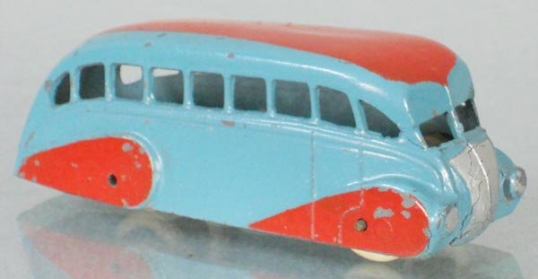 DINKY 293 STREAMLINED BUS: blue & red, w/cast rear window, white tires flat, die cast cracking on front end, C5.