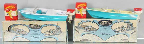 2 FLEET LINE 875 WIZARD BOATS: plastic, 12 1/2" long, both are missing trim, w/2 plastic Lang Craft Outboard Motors, orig boxes & inserts, C7.