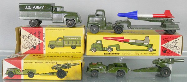 3 TOOTSIETOY ARMY VEHICLES: 3500 Truck, 3925 Rocket Launcher, 3600 Jeep w/Howitzer, orig boxes minor wear, C7-8.