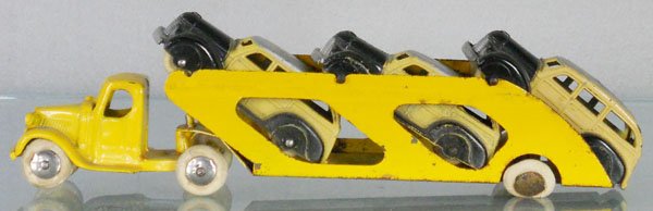 TOOTSIETOY 187 AUTO TRANSPORT: Mack w/3 #239 wagons, trailer hitch glued, 2 tires worn, C5.