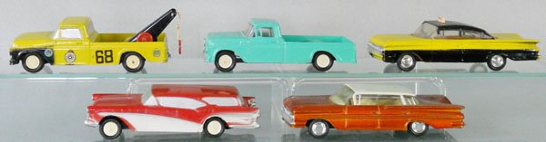 5 BUBY AUTOS: die cast w/tin chassis, 1006 Ford Wrecker, 1004 Ford Pick Up, 1010A Chevrolet Taxi, plastic roof cracked w/broken posts, 1001 Buick Caballero, 1009 Chevrolet Impala, C6-8.