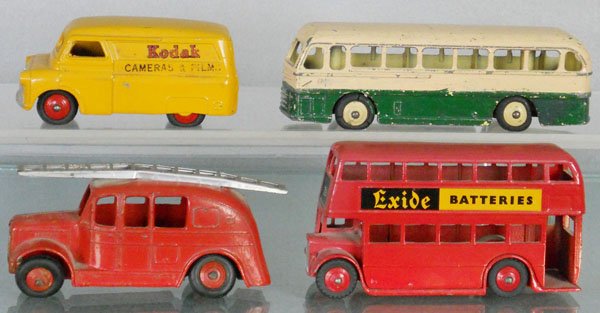 4 DINKY AUTOS: 480 Kodak, decal wear, 1 tire flat, 282 Duplo Bus, top repainted, 250 Fire Truck, oxidation spots on front grille, 29C Doubledecker Bus, C5-6.