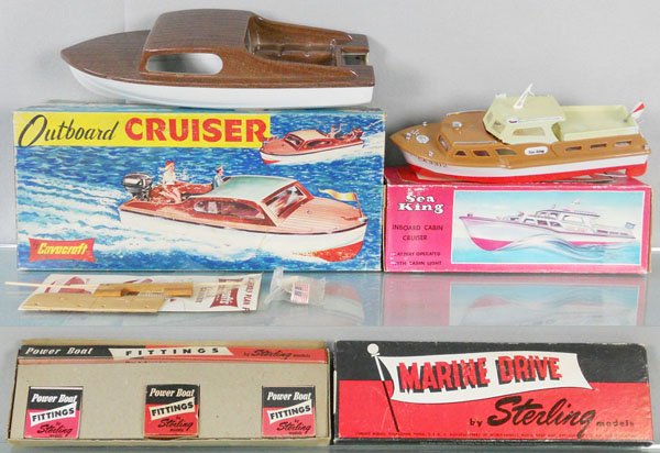 2 TOY BOATS: plastic, Corocraft E9 Cruiser Kit, 17" long, King 3312 Sea King Boat, 14" long, w/Sterling Marine Drive Parts Kit, orig boxes minor wear, C8-9.
