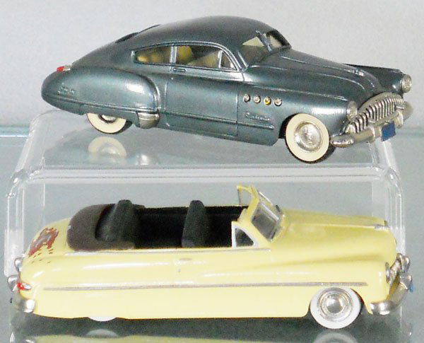 2 BROOKLIN MODELS AUTOS: white metal, #10 Buick Roadmaster 76-S Sedanet, missing section of rear bumper, #15 Mercury 2-door Coupe, giant scratch on rear trunk lid, C4-7.