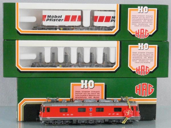 HAG SWISS TRAIN SET: HO ga, 3-rail, 207 loco w/cars 386 flat, 394 container car, orig boxes & inserts, C9.