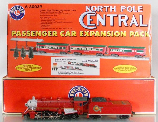 LIONEL NORTH POLE TRAIN SET: O ga, 28699 Holiday Mikado Jr loco & tender, red, w/sound & smoke, 30039 North Pole Central Passenger Can Expansion Pack containing 3 cars, track, station platform, 5 presents, 3 trees & layout, orig