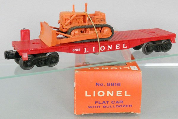 LIONEL 6816 FLAT CAR W/BULLDOZER: O ga, w/2nd version of tractor, orig box minor wear & tape, small tear in window, C8-9.