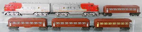 LIONEL TRAIN SET: O ga, 2343 Santa Fe AA diesels, power A has old battery damage, both diesels have partially repainted frames & trucks, touch up on cabs, both have nose decal wear, w/2422, 2 #6442 Pullmans, 6443 obsv,
