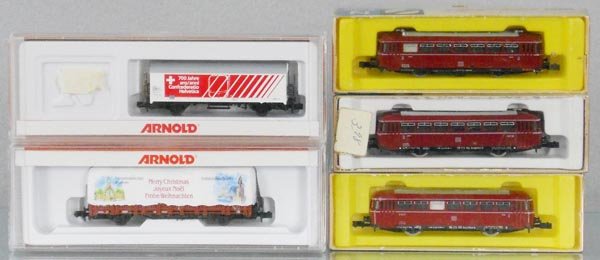 ARNOLD RAPIDO TRAIN LOT: N ga, 4551, 4466 freight cars, 0291, 0392, 0391 railbuses, orig boxes minor wear, C8-10.
