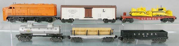 LIONEL TRAIN SET: O ga, 202 UP Alco, 3662 milk car, 6511 flat w/2 MPC tractors, 6465 tank car, 6411 log car, 6112 gondola, C5.