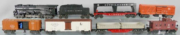 LIONEL TRAIN SET: O ga, 671RR loco, 6466WX tender, 6414 auto loader, no cars, 3656 stock car, 3464 NYC box car, 3662 milk car, 3359 double dump, lettering worn, 6357 caboose, C5.