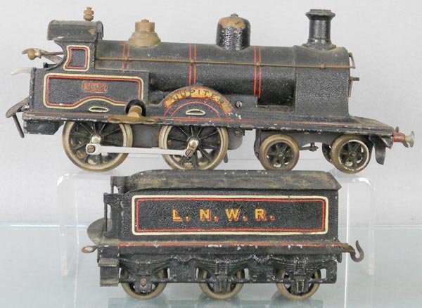 BING JUPITER LOCO & TENDER: 1 ga, loco, windup working, missing front running lights & boiler front knob, tender missing both rear buffers, paint crazed, C4-5.