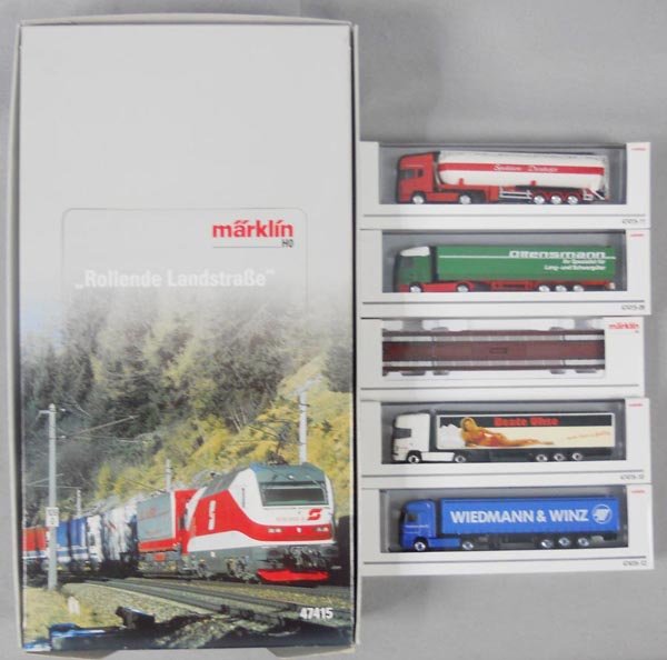 MARKLIN 47415 FLAT CAR & TRUCK SET: HO ga, w/8 #47415 flat cars & 8 tractor trailers, orig boxes, inserts & set box, C9.