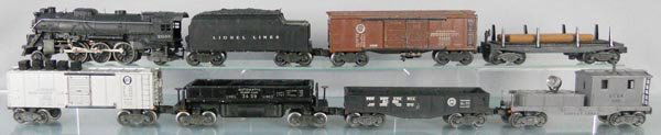 LIONEL TRAIN SET: O ga, 2026 loco, cowcatcher has chipped step, corner of cab roof bent, 2466WX tender, 2458 box car, 3451 log car, 3454 merchandise car w/cubes, 3459 dump, 2452X gondola, 2420 searchlight work caboose,