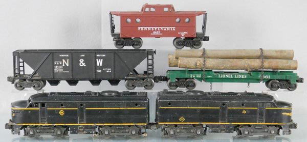 LIONEL TRAIN SET: O ga, 2032 Erie AA, oxidation in battery box, both nose decals & side decals are worn or missing, 1 step broken on dummy A, 6446 N&W hopper, 6361 log car, 6437 PRR caboose, locos have a worn master ca