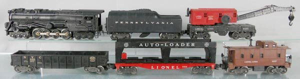 LIONEL TRAIN SET: O ga, 681 turbine loco, 2046W-50 tender, scratch on 1 side, 6460 crane, 6462 gondola, 6414 auto loader, missing autos, 6107 caboose, C5.