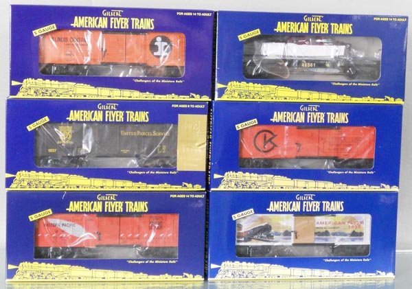 6 AMERICAN FLYER FREIGHT CARS: S ga, 48378 IC box car, 48370 UPS box car, 48388 WP box car, 48561 JC flat w/boat, 48393 Keystone Camera box car, 48390 1955 catalog box car, orig boxes, C10.