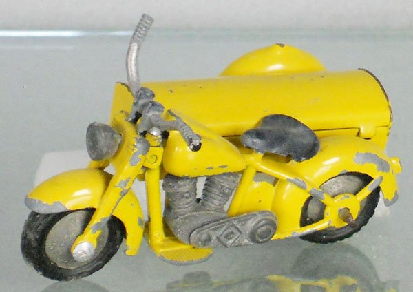 TEKNO 763 HARLEY DELIVERY MOTORCYCLE: yellow, decals chipped, handlebar bent, C4-5.