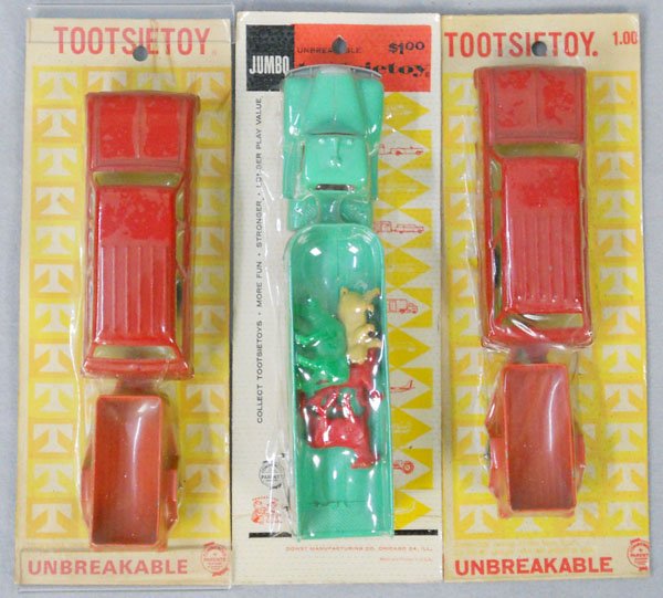 3 TOOTSIETOY AUTOS: 2 Chevrolets w/U-Haul Trailers, Mack Truck w/animals, all factory sealed on orig cards, cards have edge wear, C10.